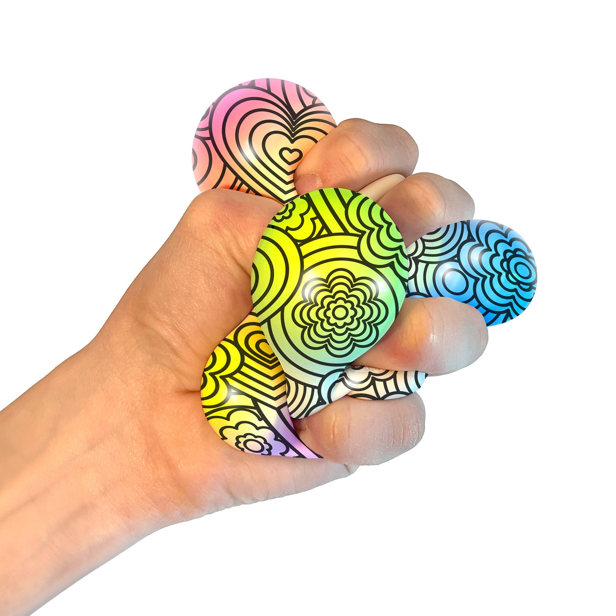 A hand squeezing a Press-Doh O9. The colorful doh is visible through the white and black designs of the exterior.